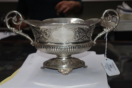 A late Victorian embossed silver two-handled shaped oval bowl, London, 1900, 18.5 oz.